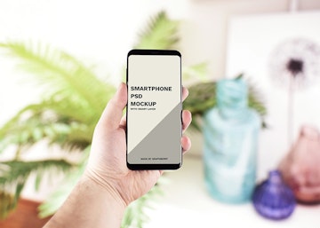 Hand Holding Smartphone Mockup