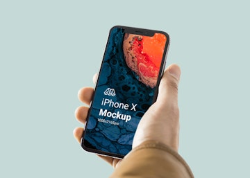 iPhone X in Hand Mockup