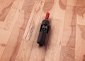 Wine Bottle PSD Mockup On Wooden Floor